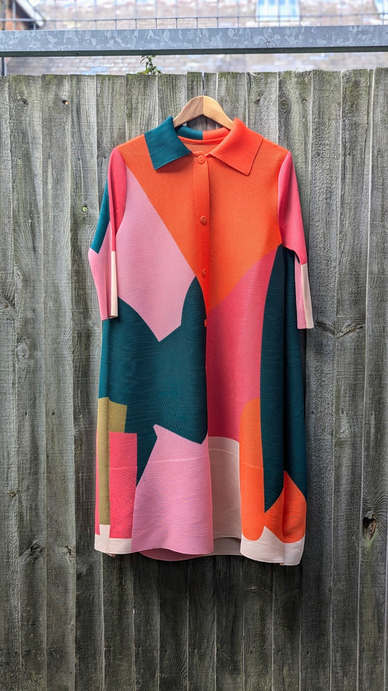 Multi coloured pleated cape dress